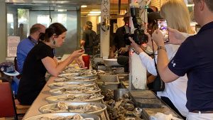 Before discussing how federal regulations impact his small business, the owner of Wintzell's invited Advocacy staff to witness a woman take on the Wintzell's oyster eating challenge to beat a record that stood for 22 years.