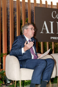 Casey Mulligan at an AI conference